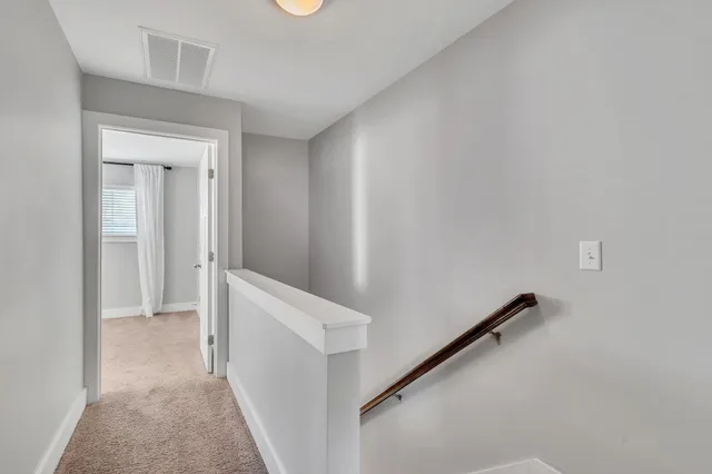 a view of hallway with closet