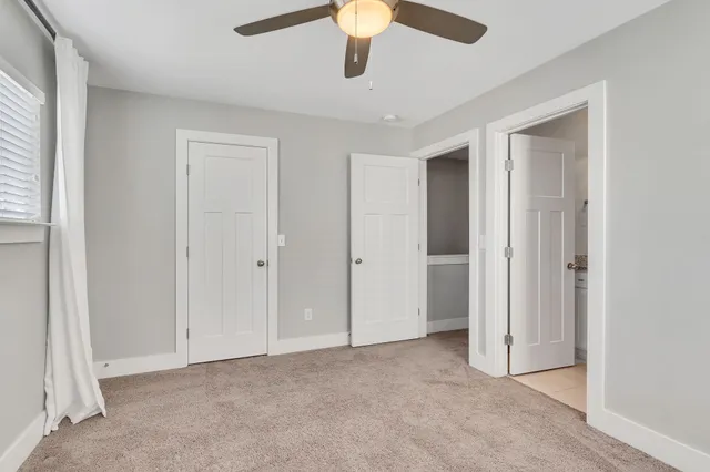 a view of an empty room and window