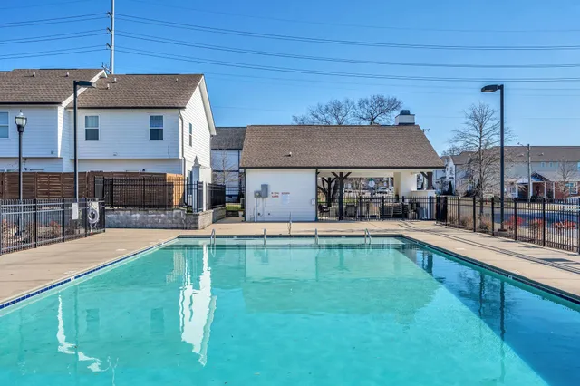 a view of a house with swimming pool