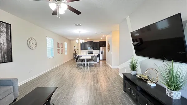 a bathroom with a sink vanity and a mirror