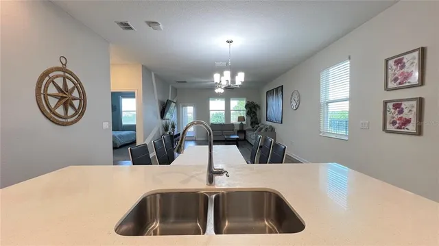 a view of storage and utility room with racks on the wall