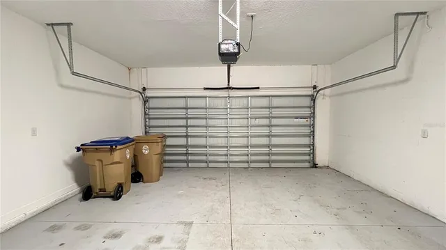 a view of hallway with wooden floor