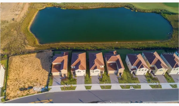 a bathroom with a sink toilet and mirror