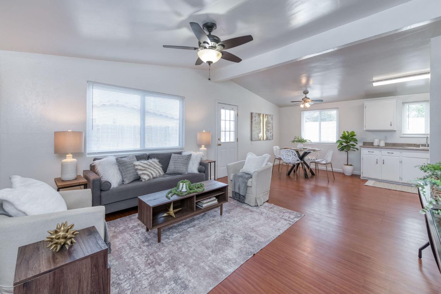 2607 Crescent Avenue Clovis, CA 93612 - Photo 2 of 26 a living room with furniture and wooden floor