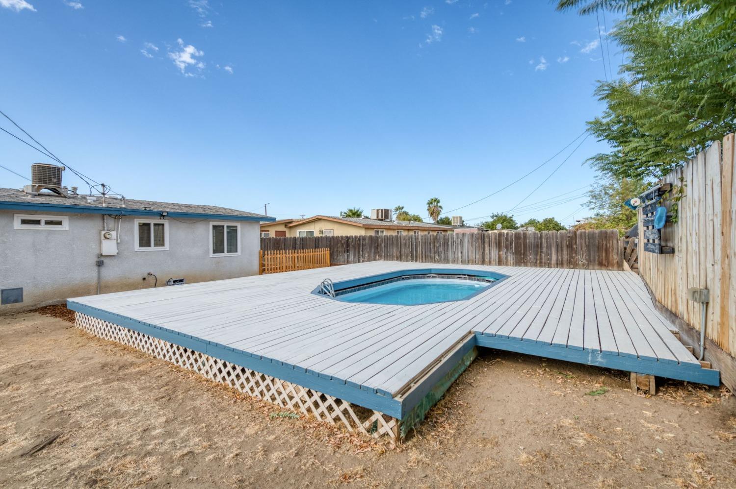 2607 Crescent Avenue Clovis, CA 93612 - Photo 25 of 26 a view of a roof deck with wooden floor and fence