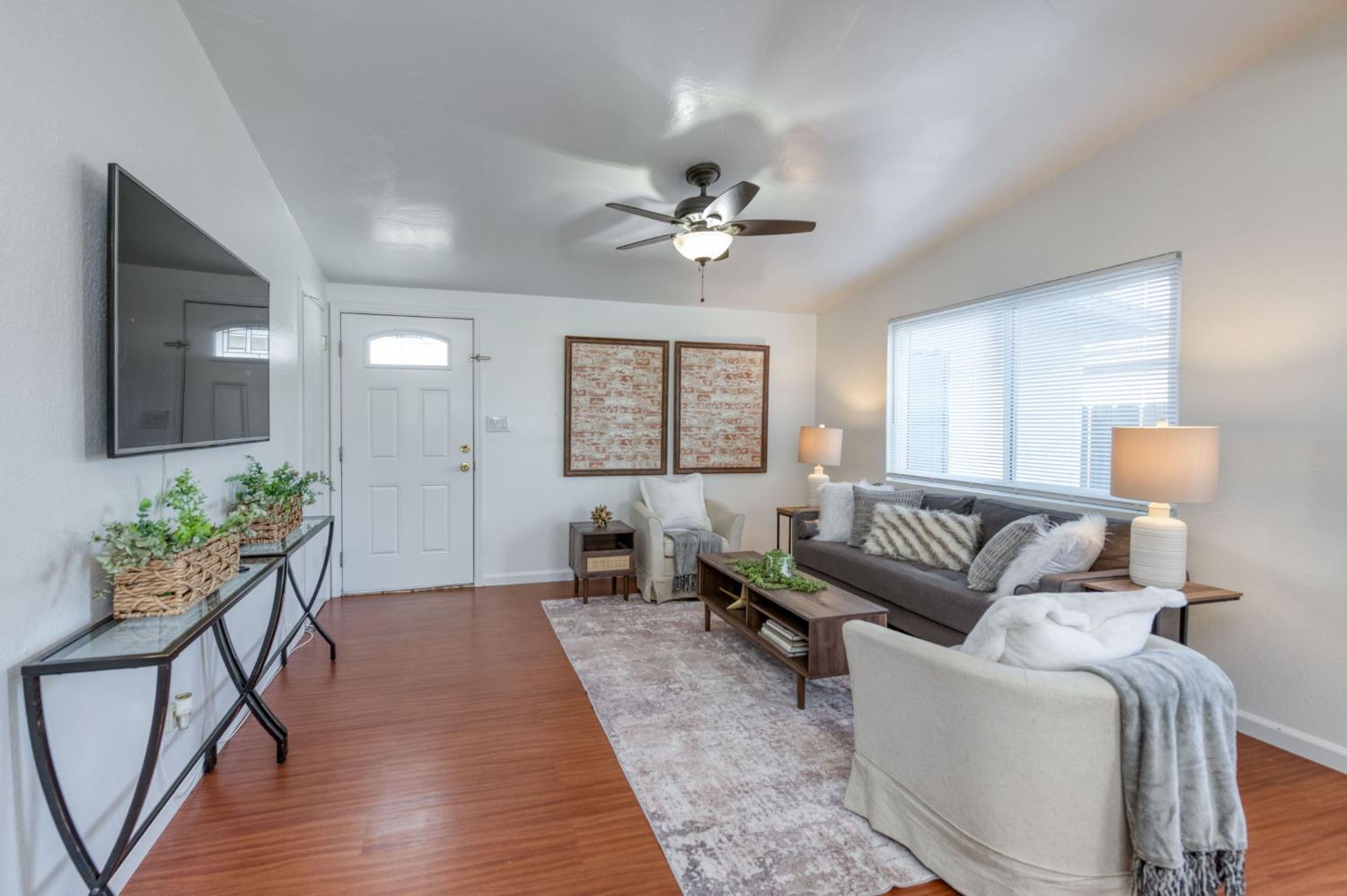 2607 Crescent Avenue Clovis, CA 93612 - Photo 7 of 26 a living room with furniture and a window