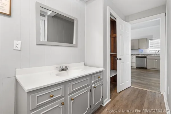 a view of a kitchen from the hallway