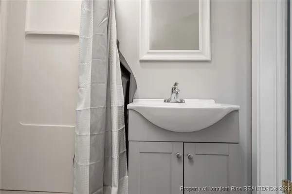 a sink with a mirror