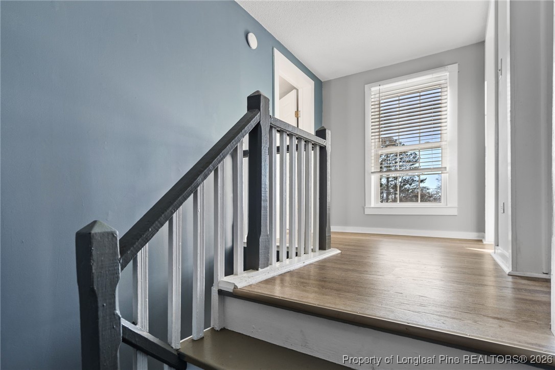 107 North 12th Street Erwin, NC 28339 - Photo 22 of 40 a view of entryway with wooden floor