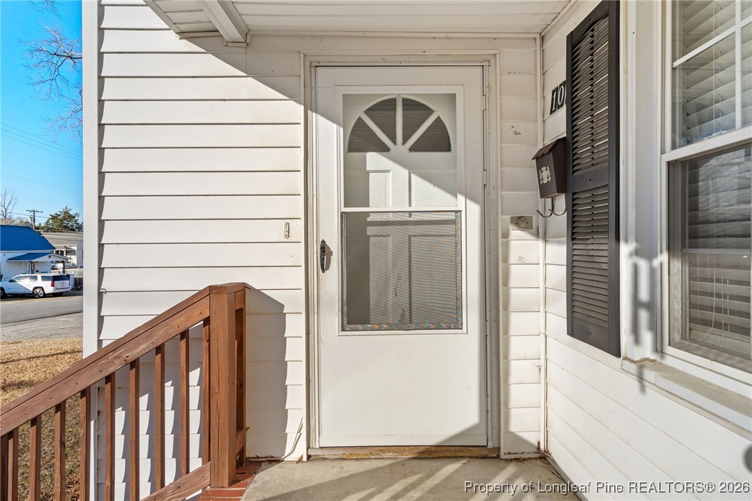 107 North 12th Street Erwin, NC 28339 - Photo 6 of 40 a view of wooden door