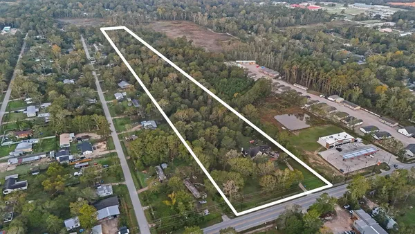 a view of a balcony with two chairs