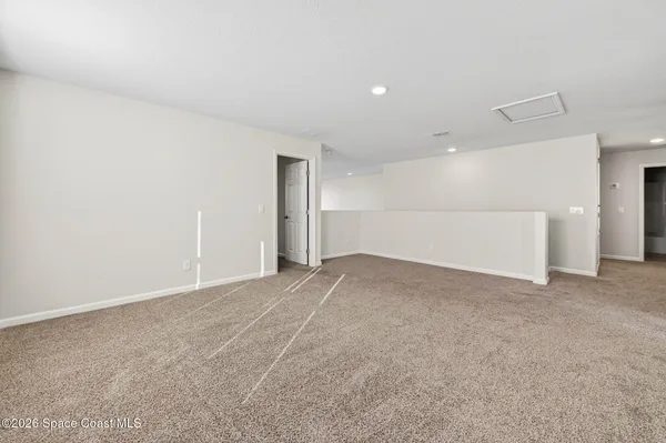 an aerial view of a house with swimming pool