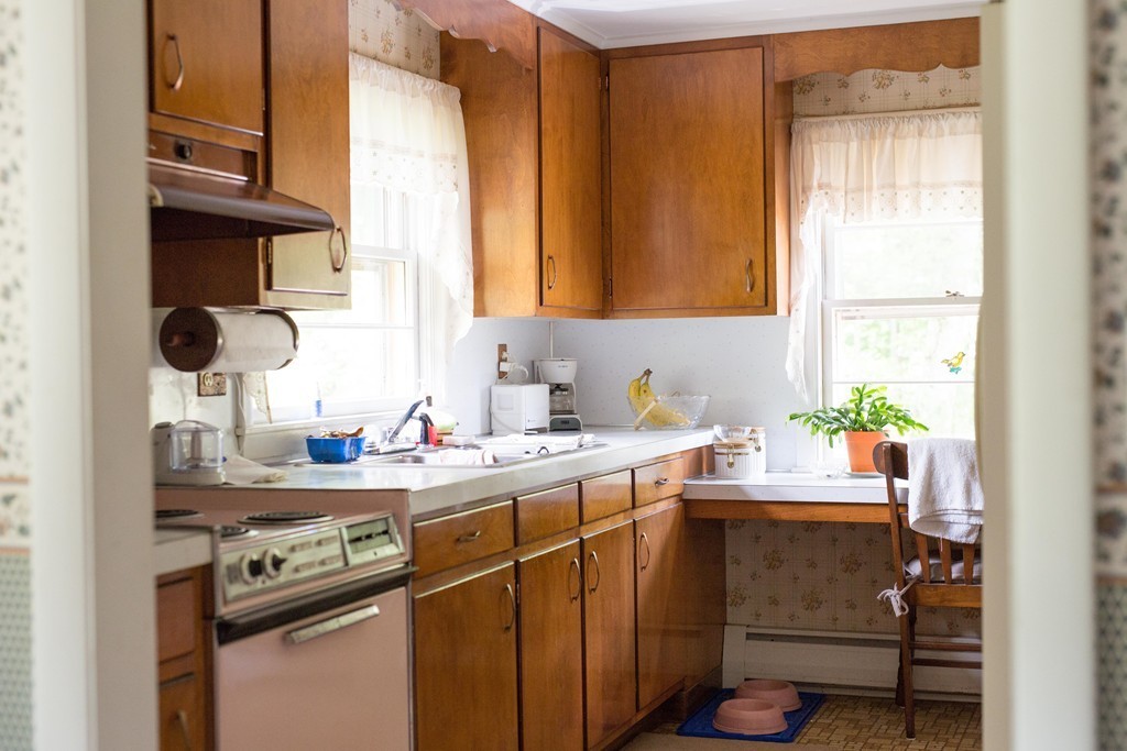 55 Birch Meadow Road Merrimac, MA 01860 - Photo 5 of 7 a kitchen with a sink cabinets and window