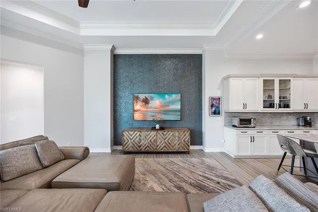 a living room with furniture and a couch