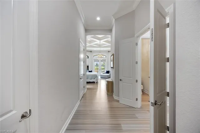 a large bathroom with a large tub and sink
