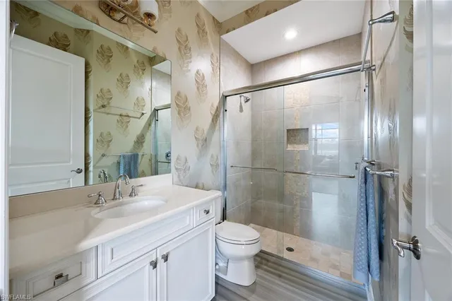 a view of workspace with a window and cabinet