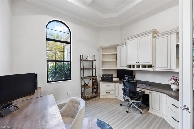 a swimming pool with outdoor seating