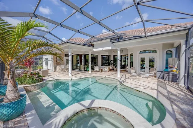 a view of a swimming pool with a porch