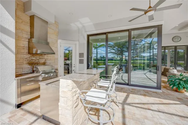 a view of a swimming pool with a patio