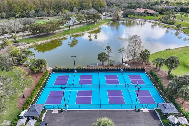 a view of a big yard with a garden and plants