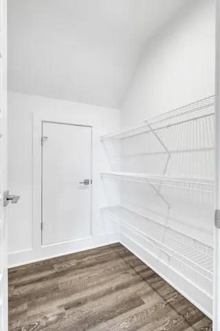 a view of a room with an empty space