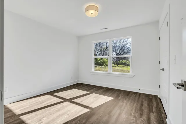 an empty room with a window