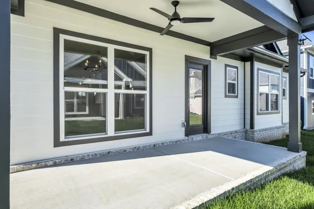 a front view of a house with a porch