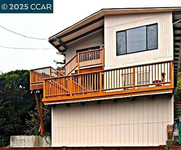 a view of a house with a deck