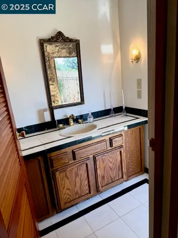 a view of front door with washer and dryer