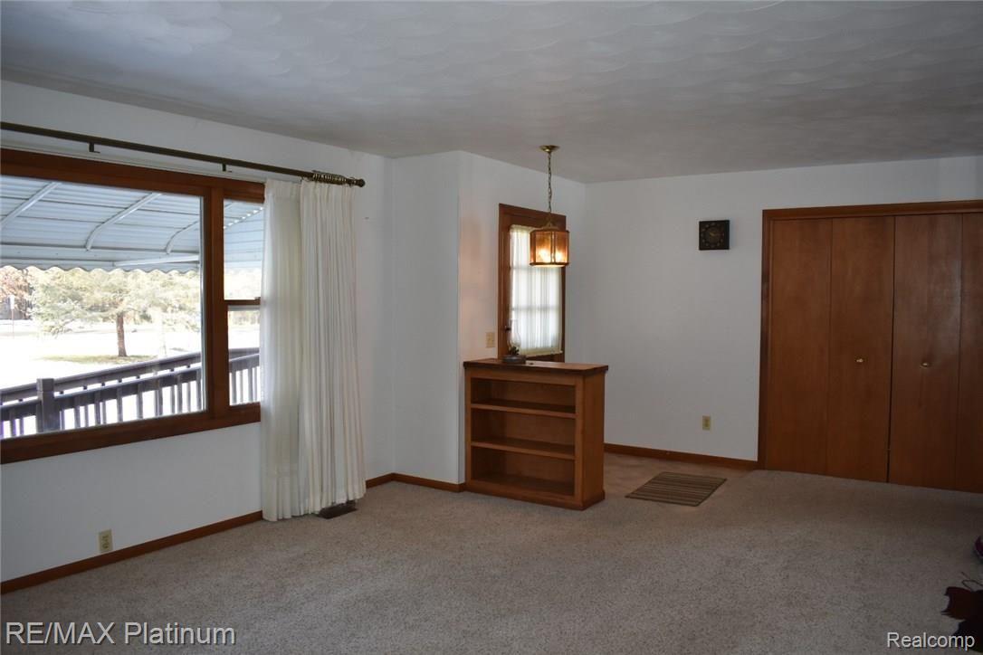12711 Byron Road Byron, MI 48418 - Photo 10 of 24 Spacious living room with large picture window