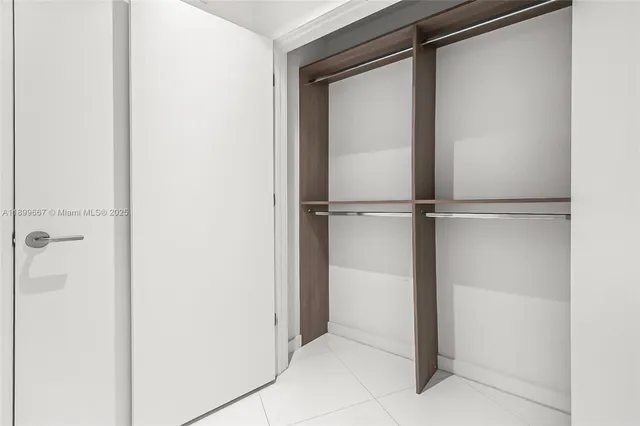 an aerial view of multiple houses with yard