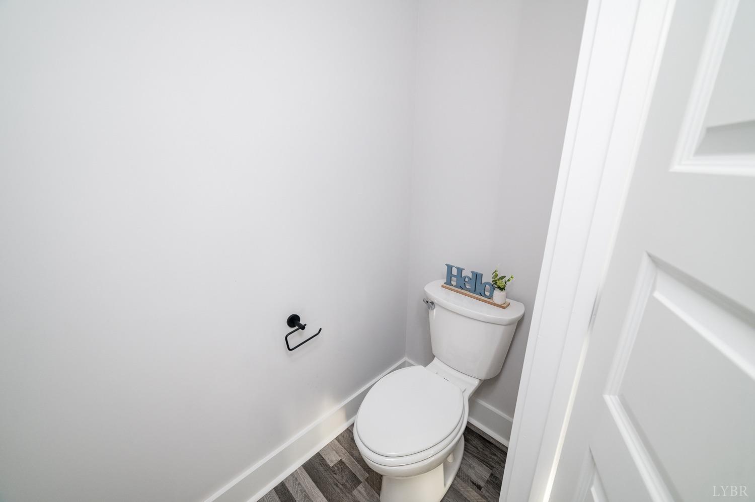 71 Allure Drive Rustburg, VA 24588 - Photo 20 of 56 a white toilet sitting next to a shower