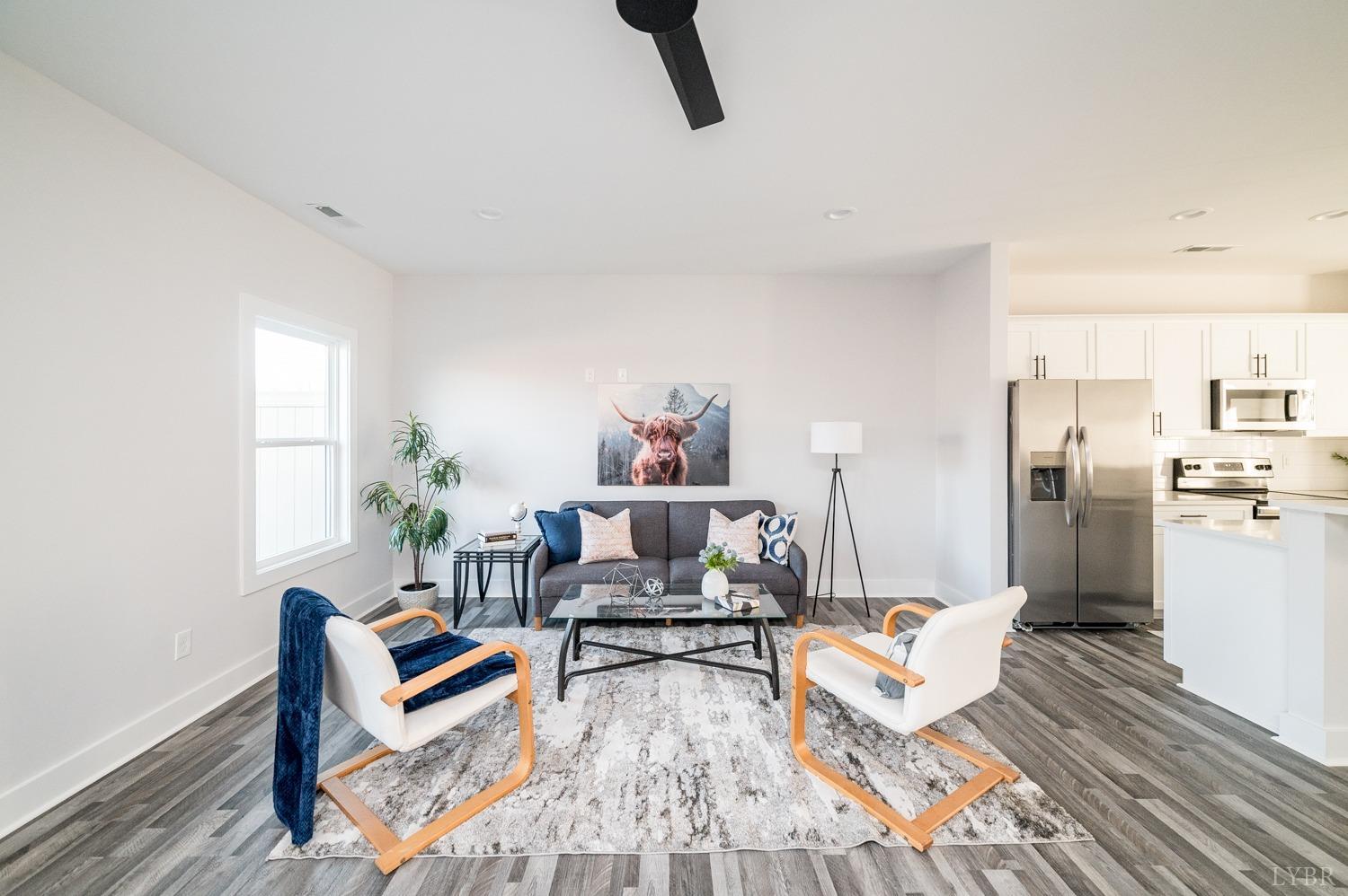 71 Allure Drive Rustburg, VA 24588 - Photo 23 of 56 a living room with furniture and a table