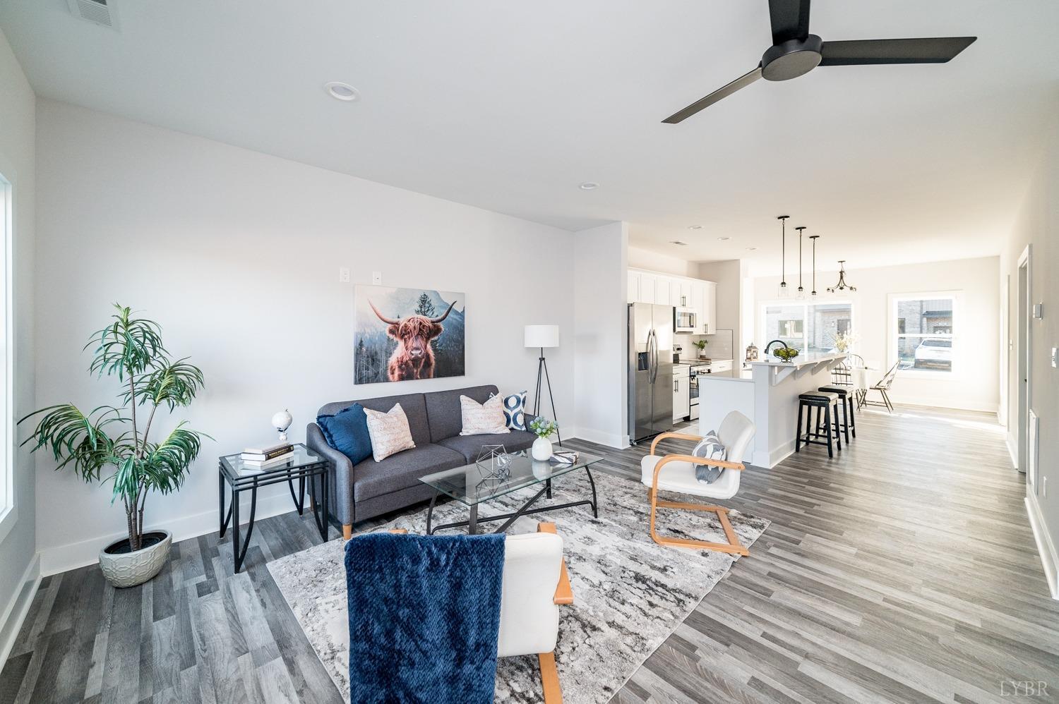 71 Allure Drive Rustburg, VA 24588 - Photo 24 of 56 a living room with furniture and wooden floor