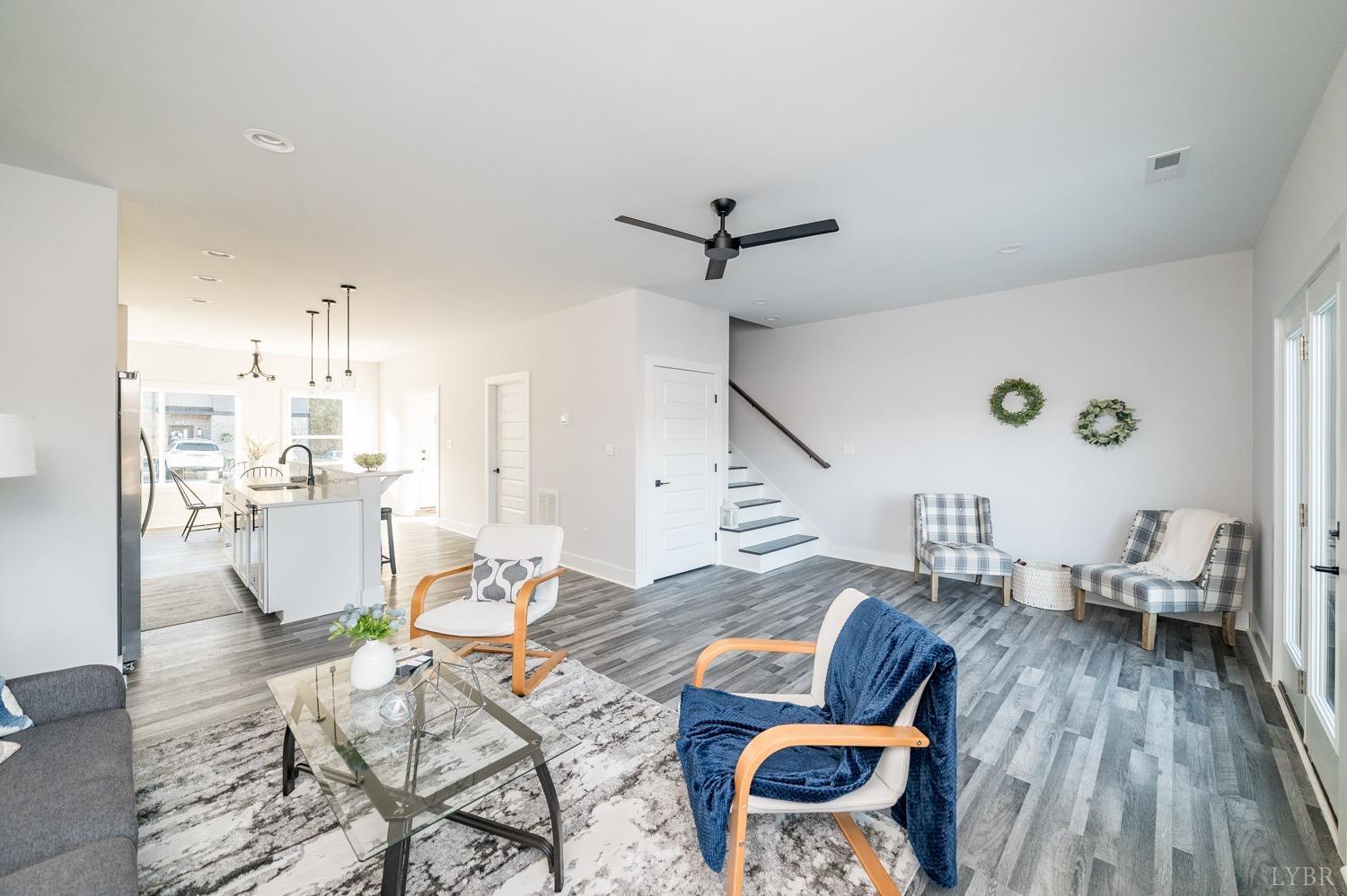 71 Allure Drive Rustburg, VA 24588 - Photo 25 of 56 a living room with lots of furniture and wooden floor