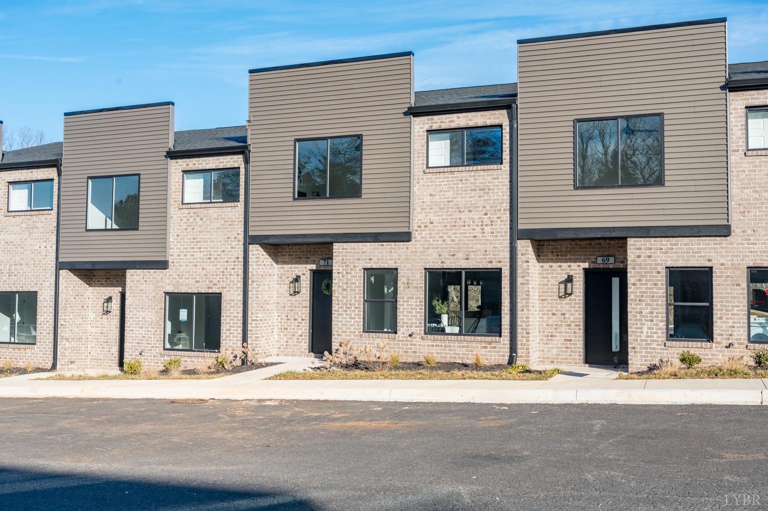 71 Allure Drive Rustburg, VA 24588 - Photo 3 of 56 a front view of a house with a road