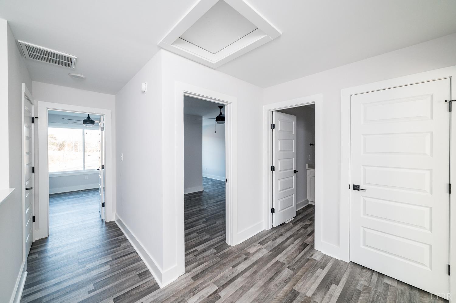 71 Allure Drive Rustburg, VA 24588 - Photo 31 of 56 a view of a hallway with wooden floor