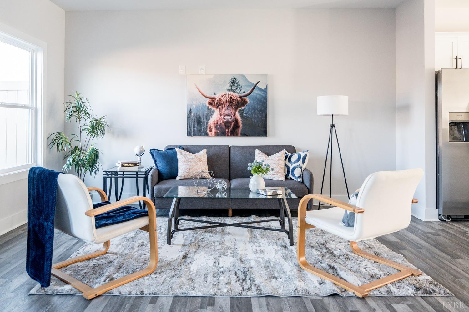 71 Allure Drive Rustburg, VA 24588 - Photo 49 of 56 a living room with furniture and a potted plant
