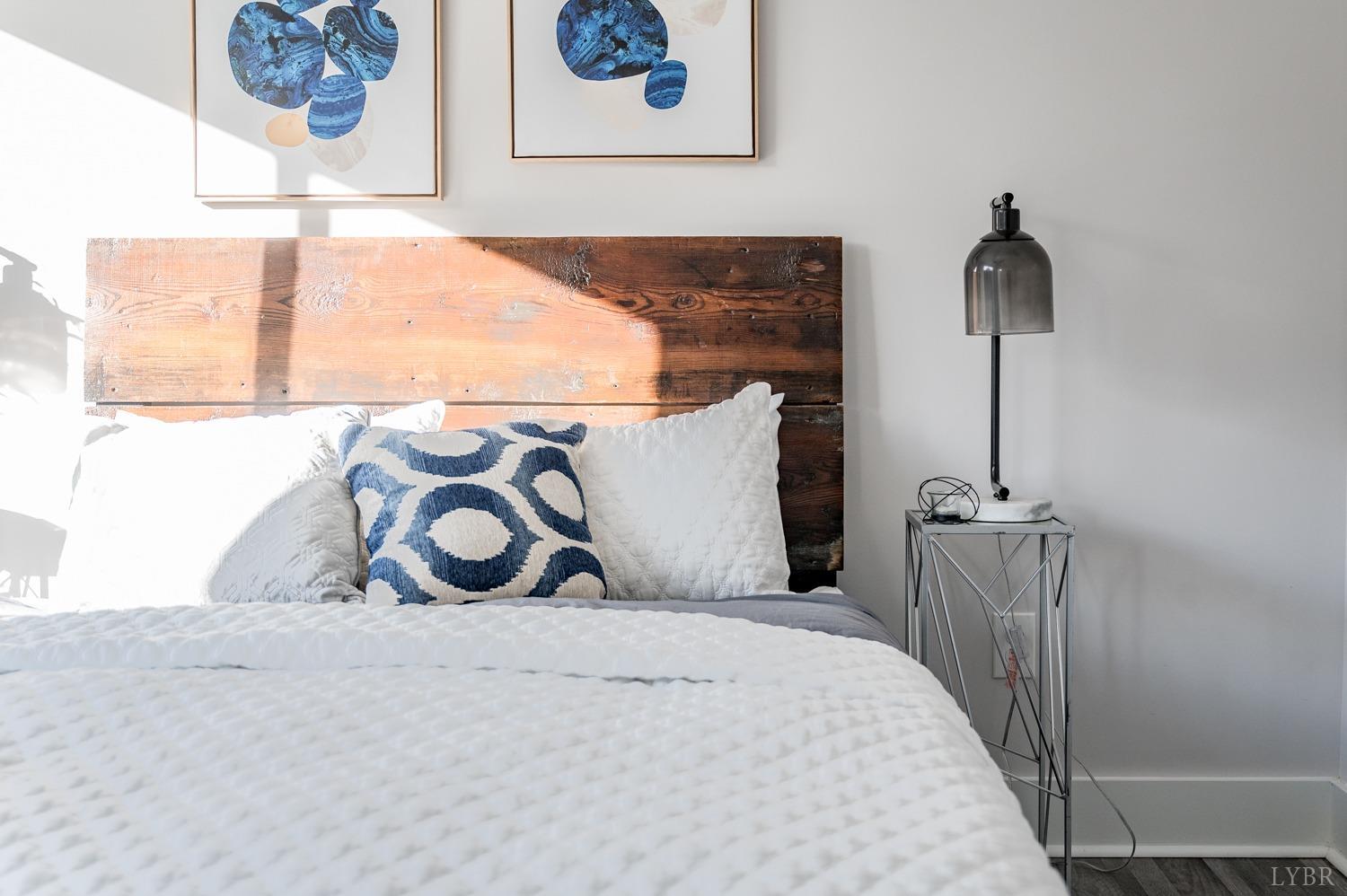 71 Allure Drive Rustburg, VA 24588 - Photo 54 of 56 a bedroom with a bed and a window