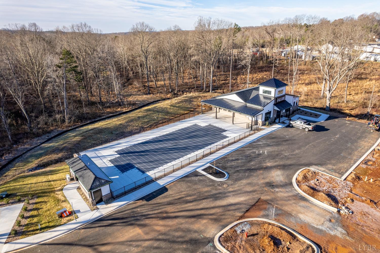 71 Allure Drive Rustburg, VA 24588 - Photo 6 of 56 a view of a backyard with couches chair and wooden floor