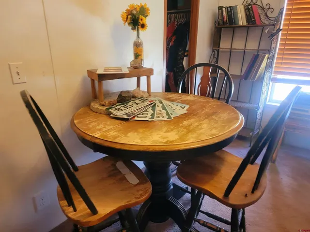 a view of walk in closet with clothes