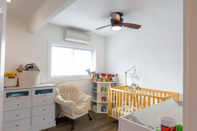 a bedroom with a bed and a cabinets