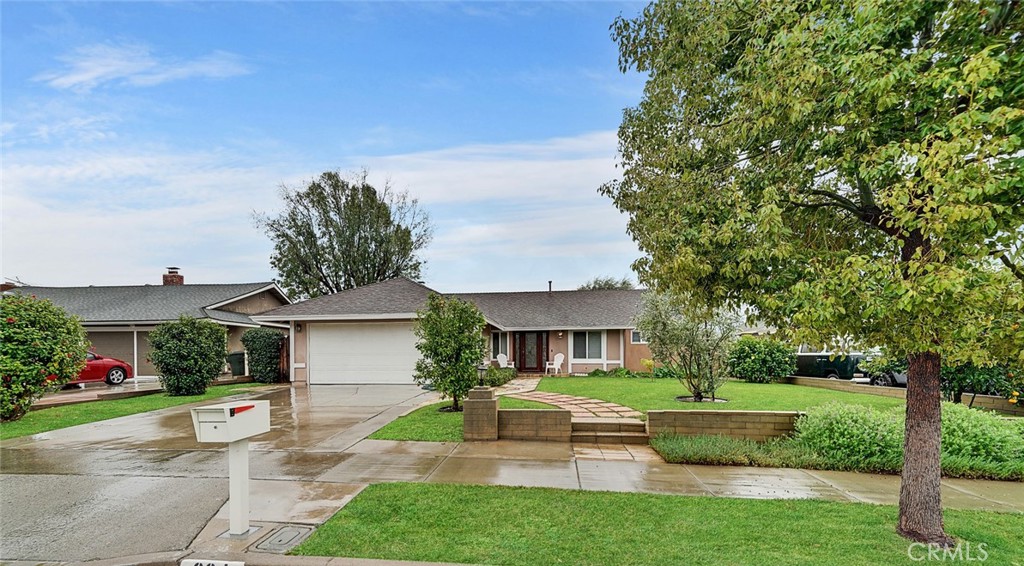 924 Redbud Street Brea, CA 92821 - Photo 1 of 1 a front view of house with yard and green space