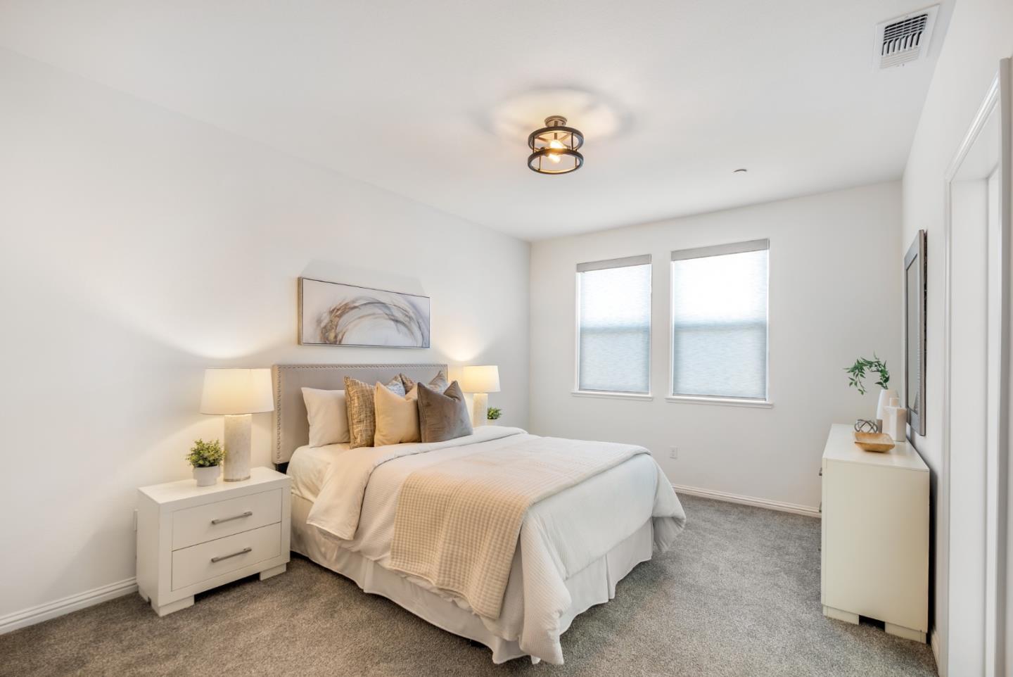 5724 Immersion Loop San Jose, CA 95119 - Photo 11 of 24 a bedroom with a bed and a window