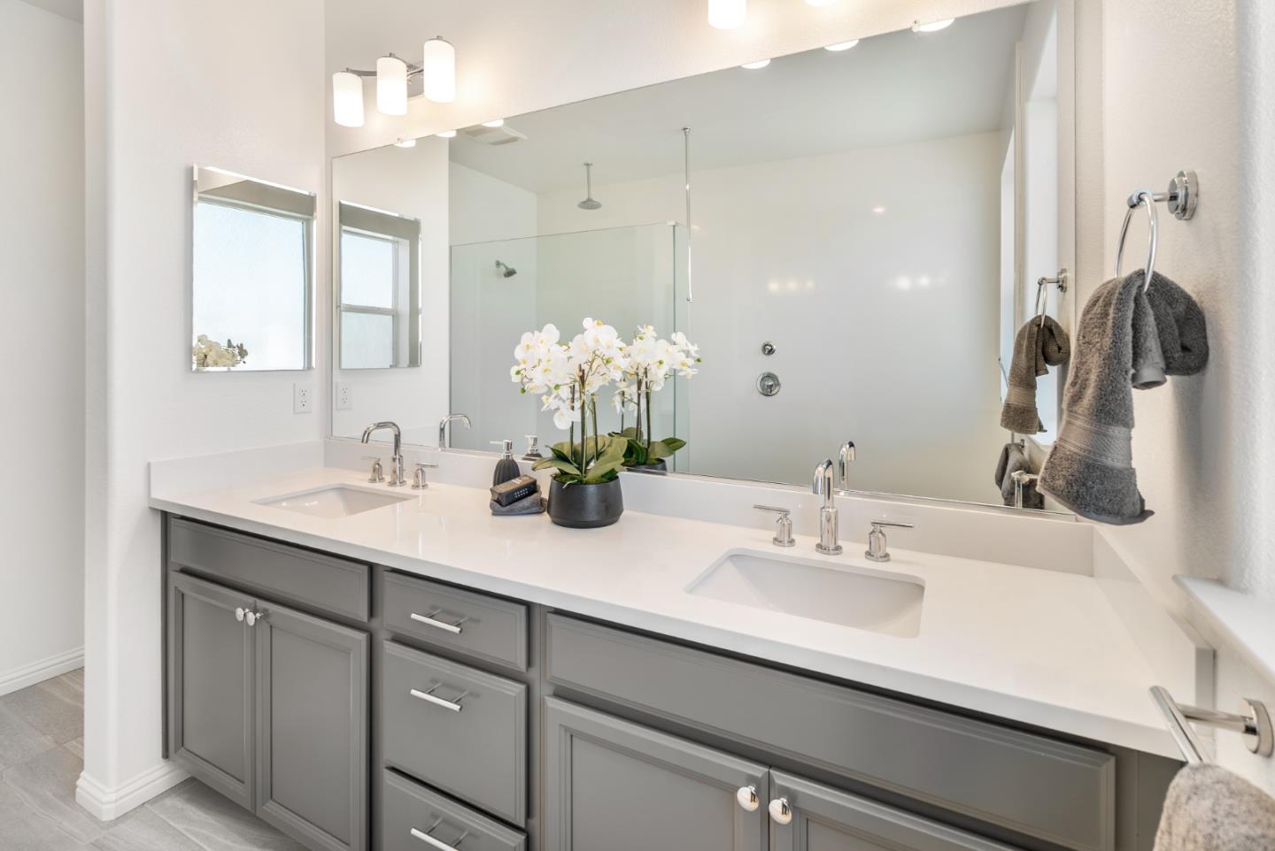 5724 Immersion Loop San Jose, CA 95119 - Photo 12 of 24 a bathroom with a sink double vanity and a mirror