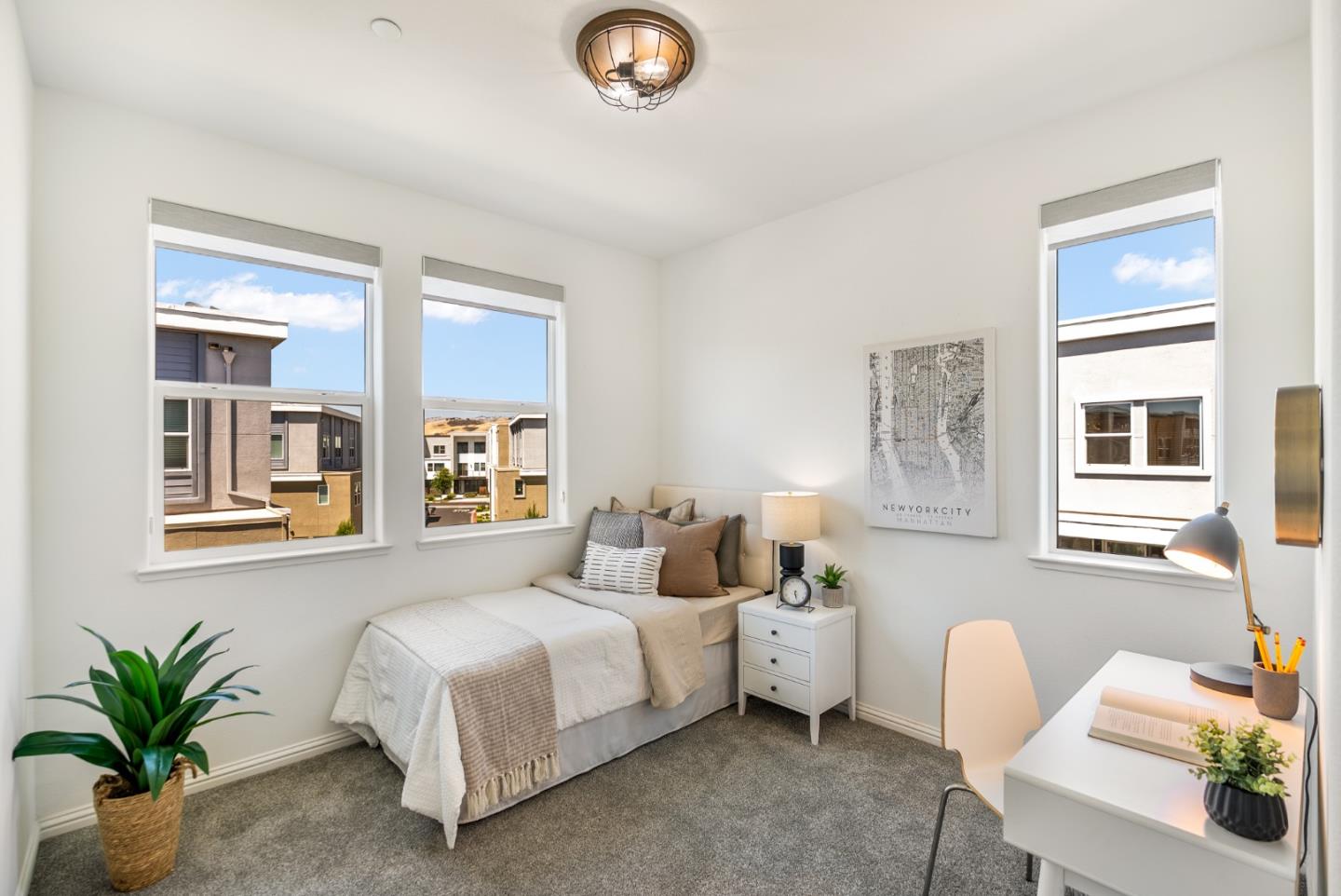 5724 Immersion Loop San Jose, CA 95119 - Photo 16 of 24 a bedroom with a bed and chair