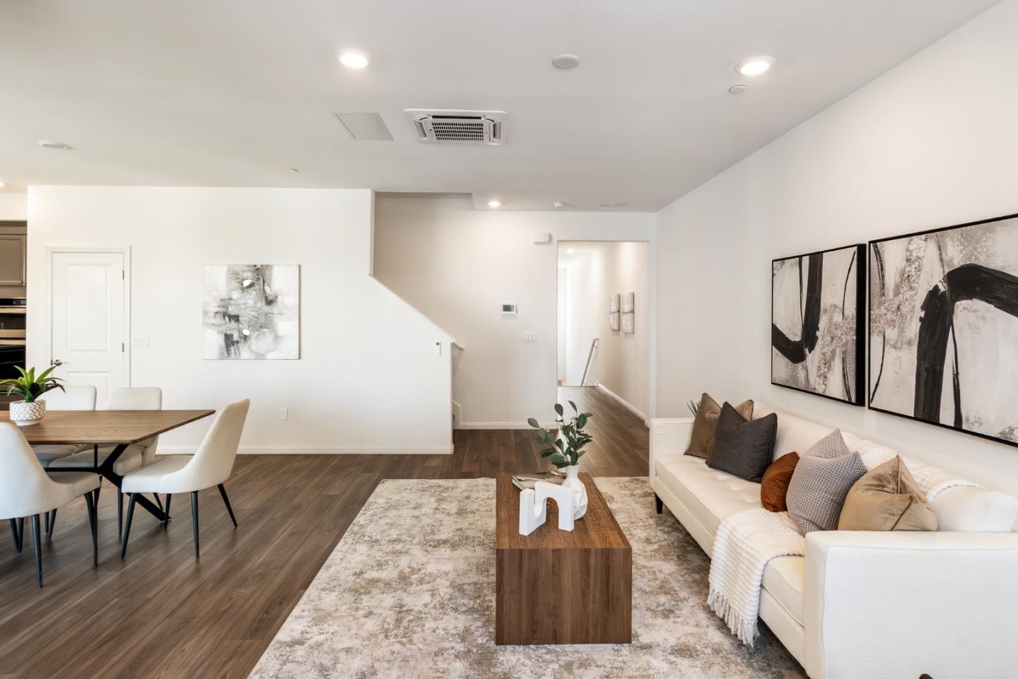 5724 Immersion Loop San Jose, CA 95119 - Photo 6 of 24 a living room with furniture and wooden floor