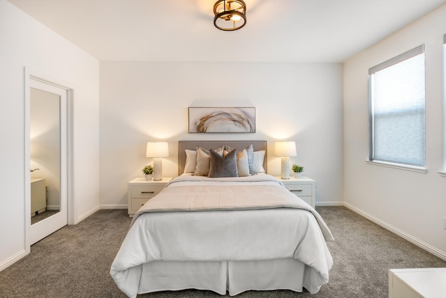 5724 Immersion Loop San Jose, CA 95119 - Photo 10 of 24 a bedroom with a bed and window