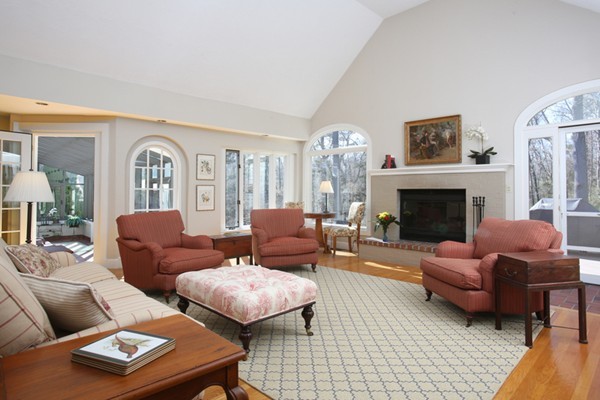 25 Columbine Road Weston, MA 02493 - Photo 3 of 11 a living room with furniture and a fireplace