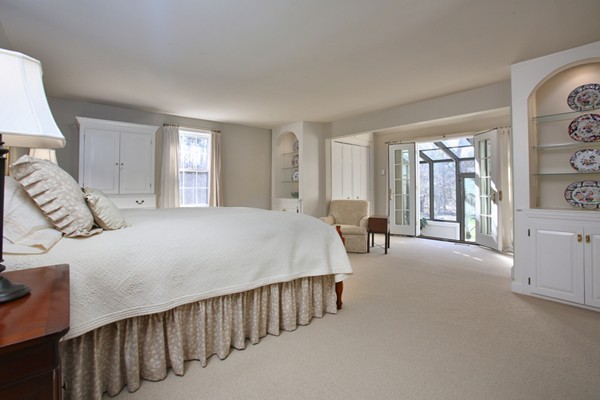 25 Columbine Road Weston, MA 02493 - Photo 7 of 11 a bed room with a bed and a large window